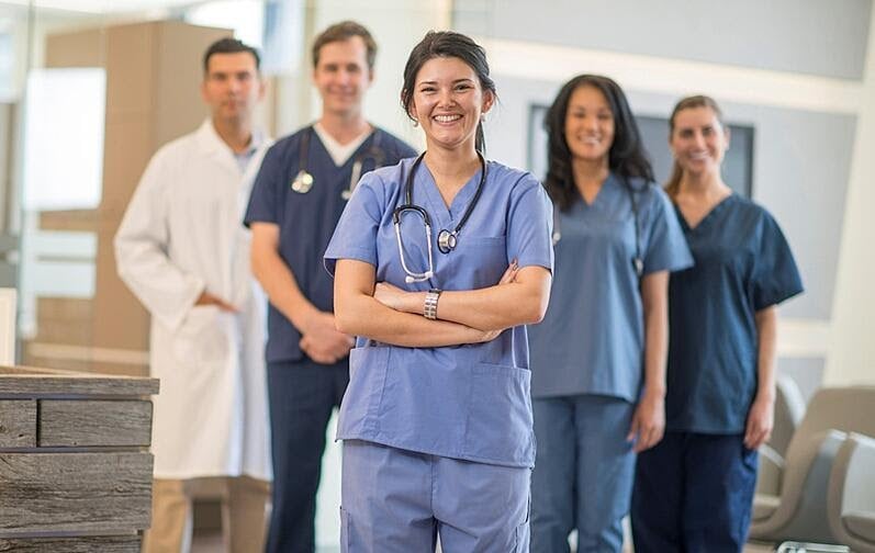 a group of nurses standing together